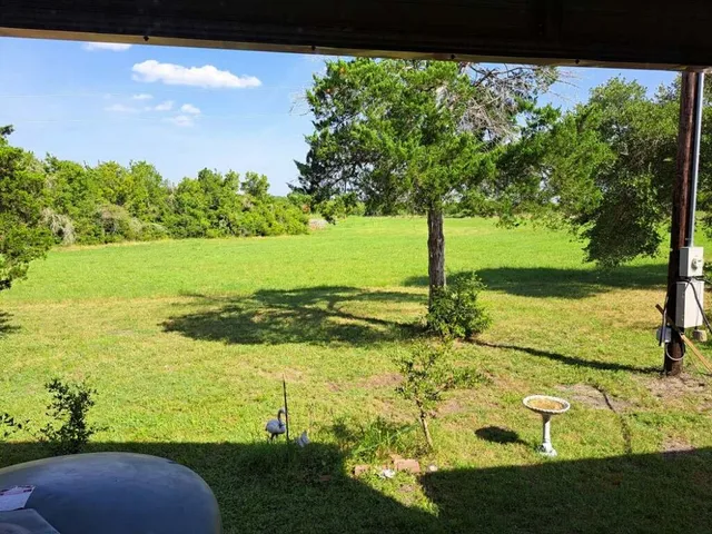 a view of an ocean from a yard