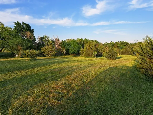 a view of an ocean with a big yard