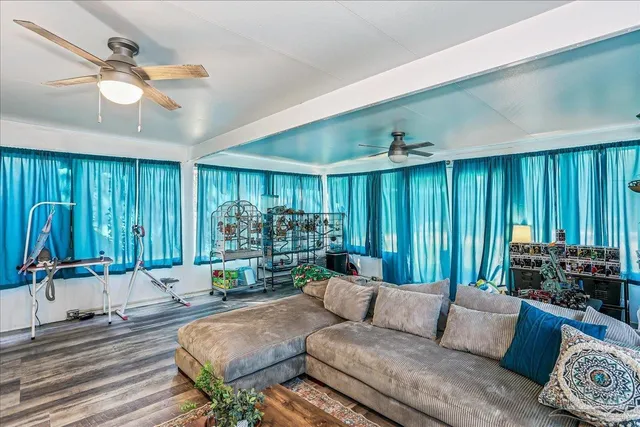 a view of a swimming pool with a lounge chair