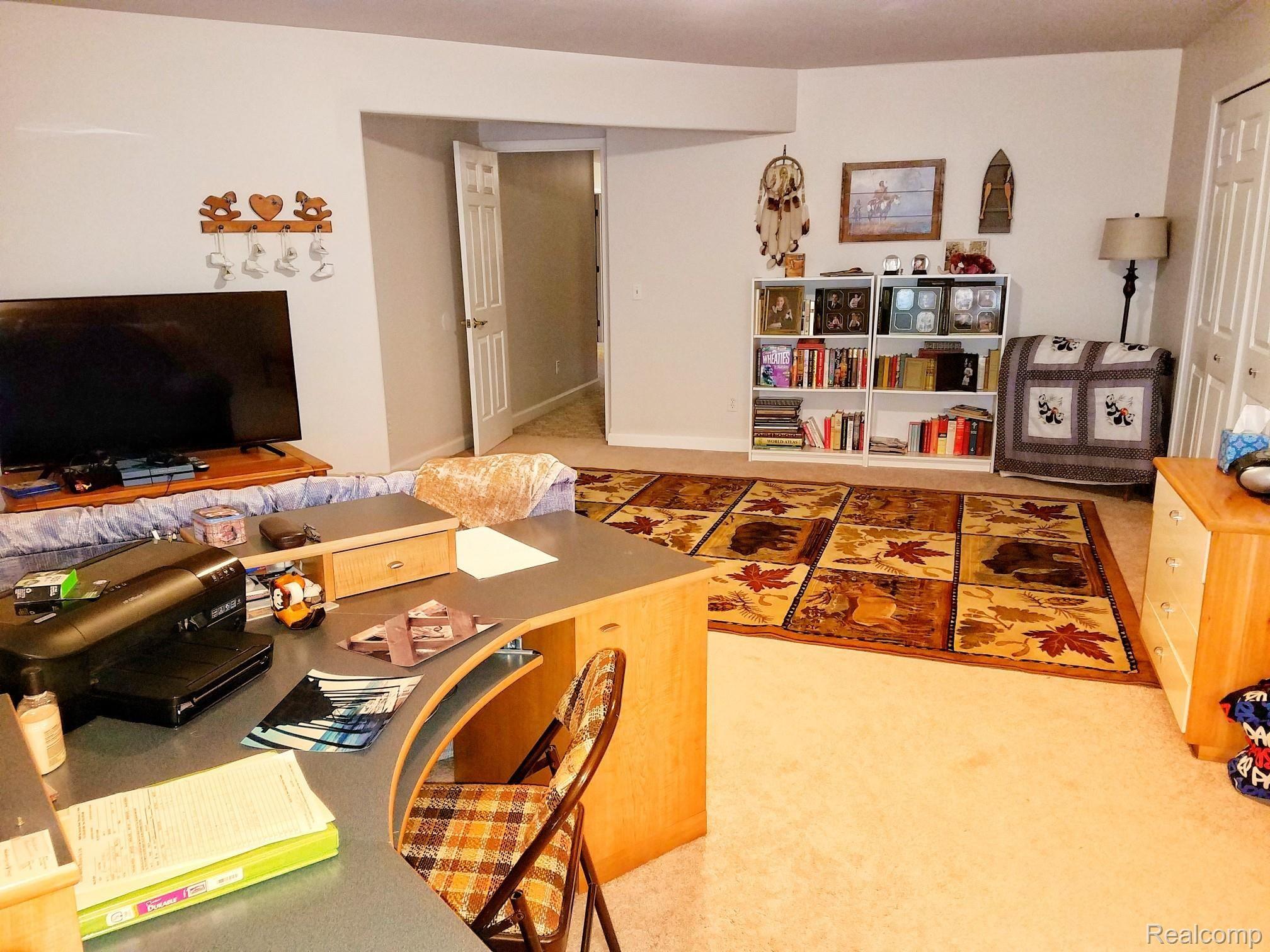 2279 Sundance Ridge Howell, MI 48843 - Photo 25 of 41 Bonus area, could be BR or Theatre rm, Mom Craft rm or Man cave,