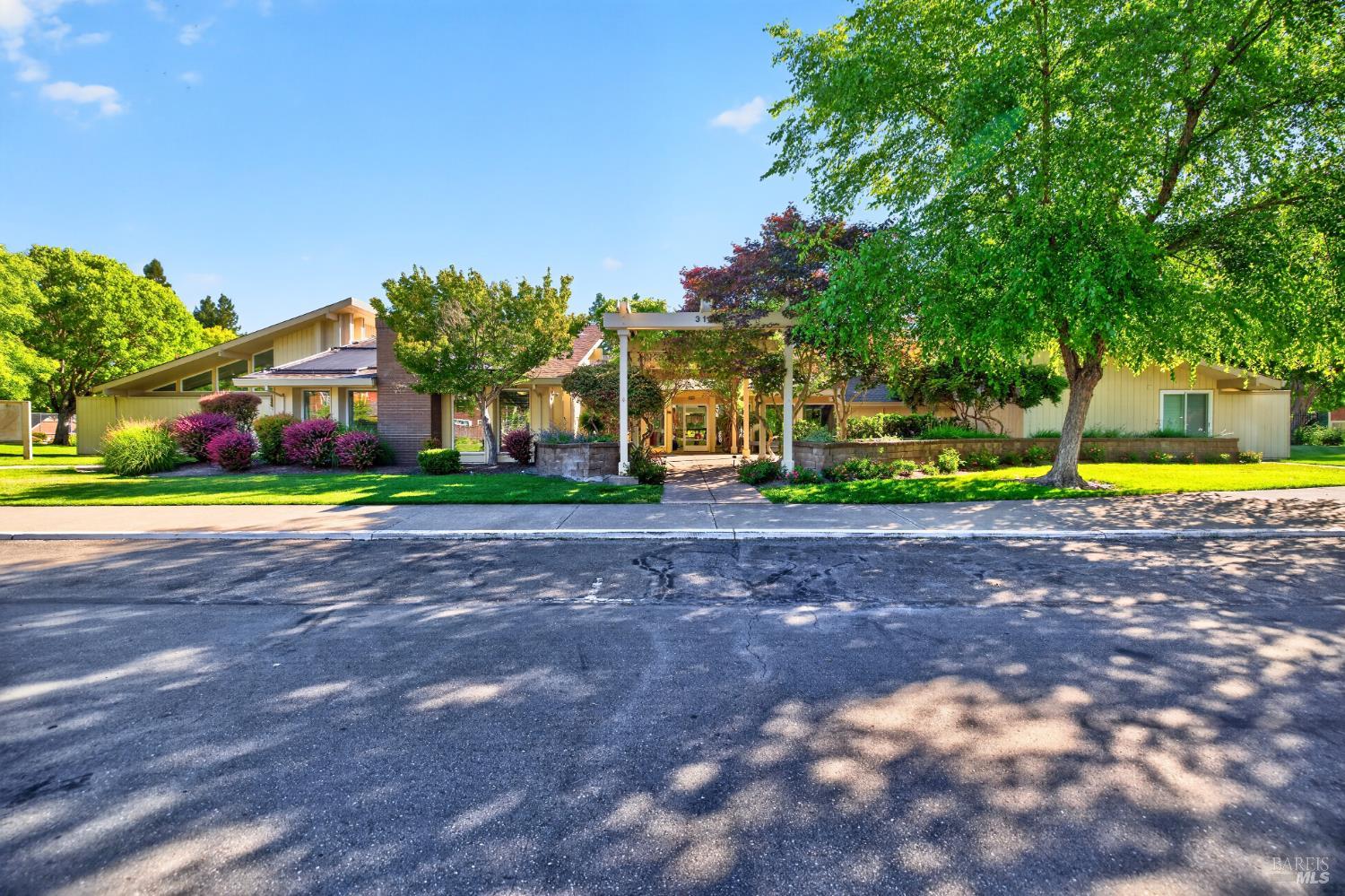 2757 Lakeview Drive Santa Rosa, CA 95405 - Photo 50 of 54 a view of a big house with a big yard and palm trees
