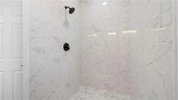 a bathroom with a sink and mirror