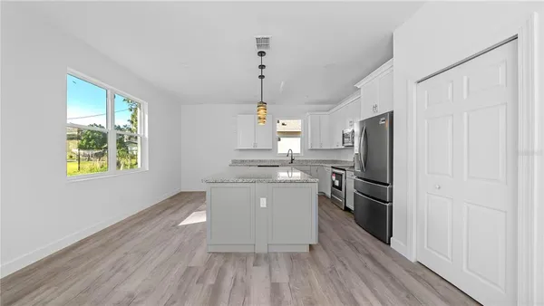 a view of a room with an empty space