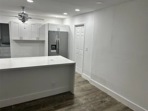 a view of a room that has a window in it