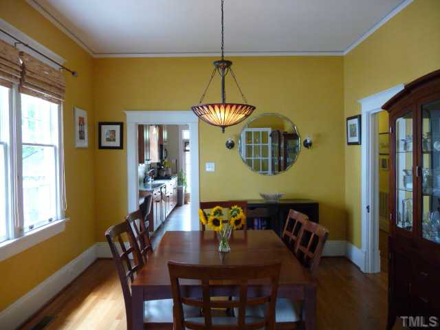 414 Cutler Street Raleigh, NC 27603 - Photo 5 of 12 The old-house character, sensitively retained, includes old oak floors in the living and dining rooms, heart pine floors in the kitchen and downstairs bedrooms, picture molding and keyhole door hardware.