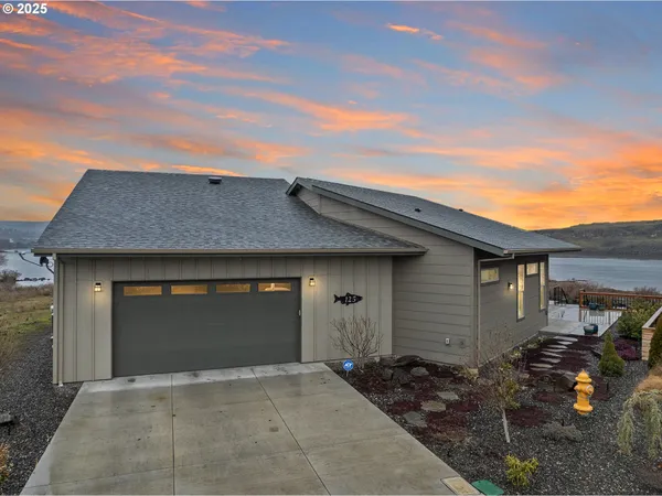 an aerial view of multiple houses with outdoor space