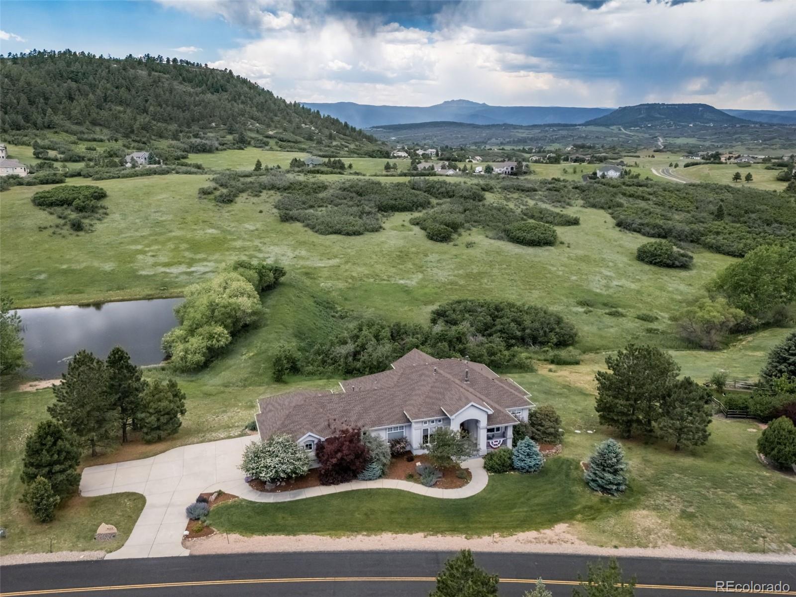 4612 High Spring Road Castle Rock, CO 80104 - Photo 47 of 50 an aerial view of a house with a garden