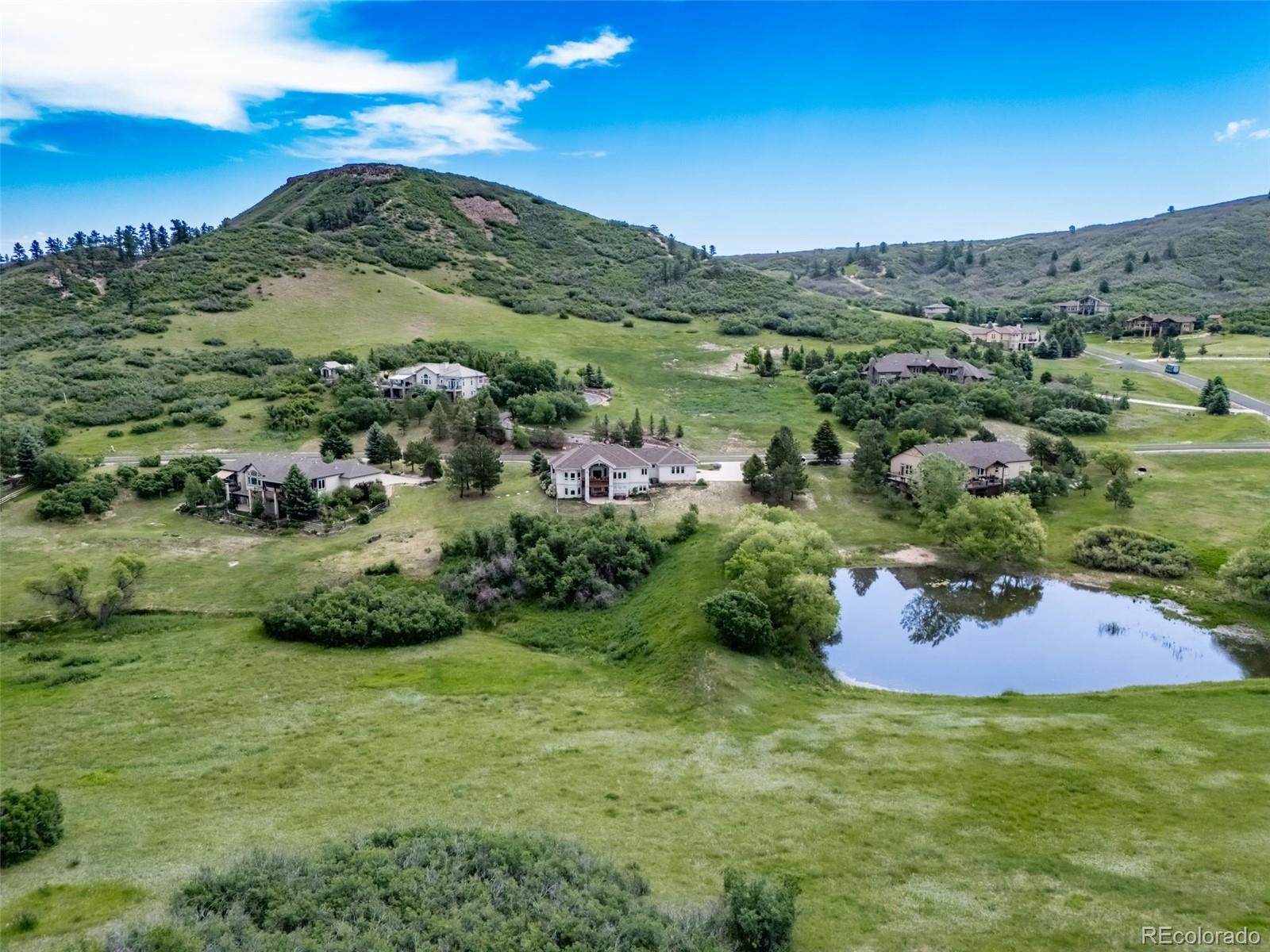 4612 High Spring Road Castle Rock, CO 80104 - Photo 50 of 50 a view of a lush green hillside and houses