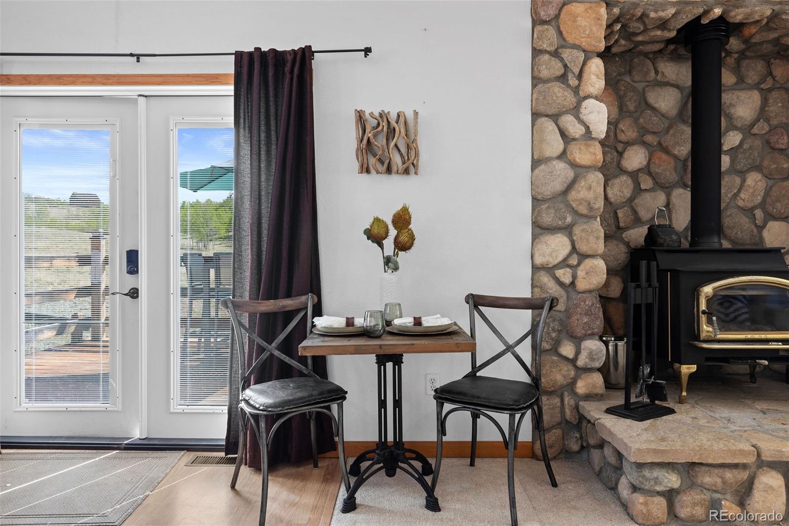 7551 Remington Road Como, CO 80432 - Photo 14 of 35 a view of a workspace with furniture and a window