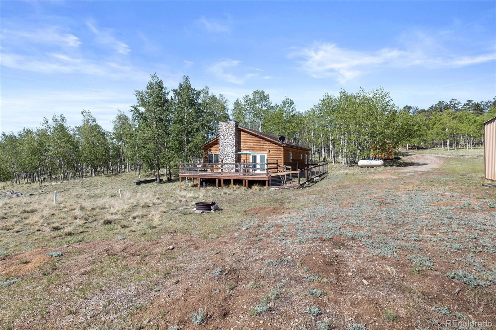 7551 Remington Road Como, CO 80432 - Photo 24 of 35 a house view with a garden space