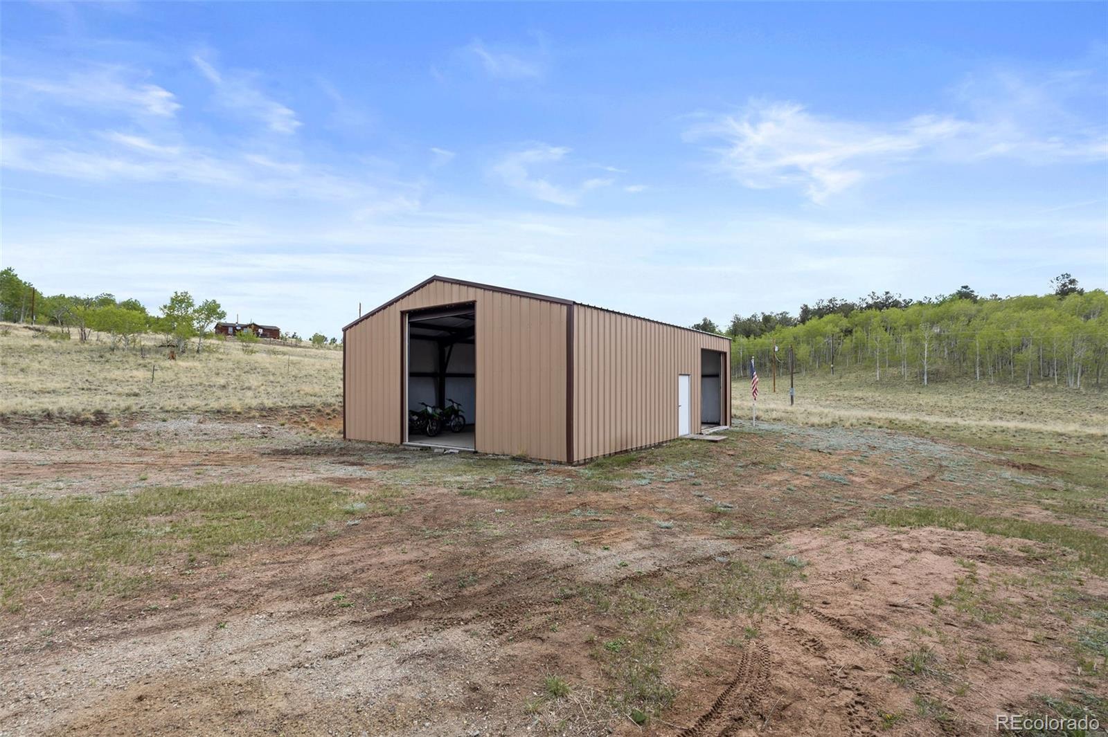 7551 Remington Road Como, CO 80432 - Photo 27 of 35 a view of a dry yard with wooden fence