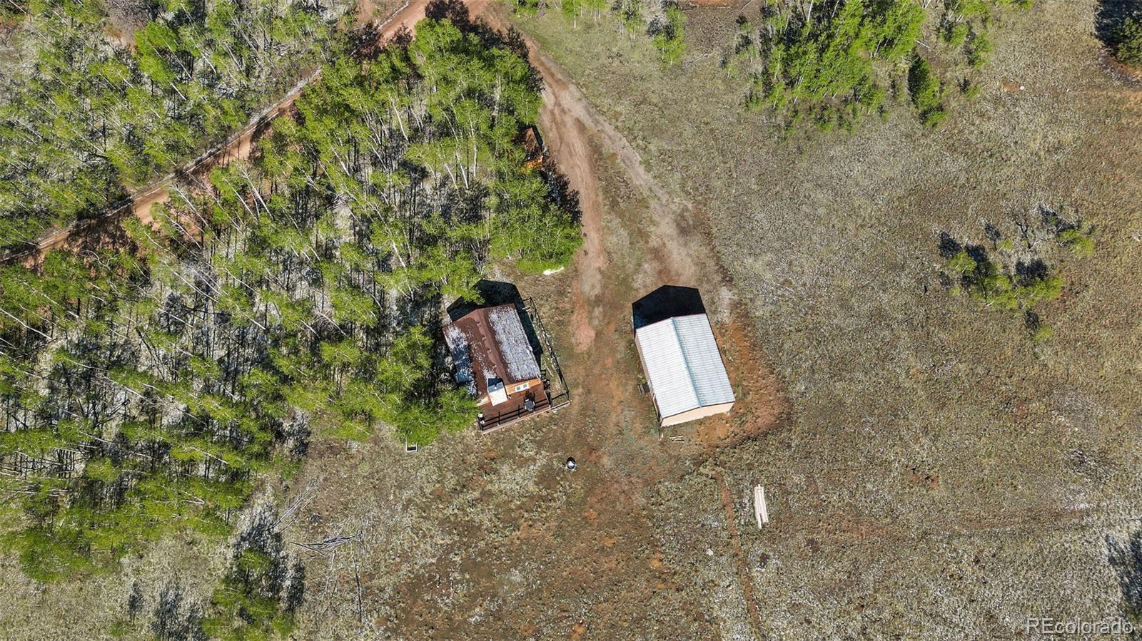 7551 Remington Road Como, CO 80432 - Photo 33 of 35 a view of outdoor space and trees