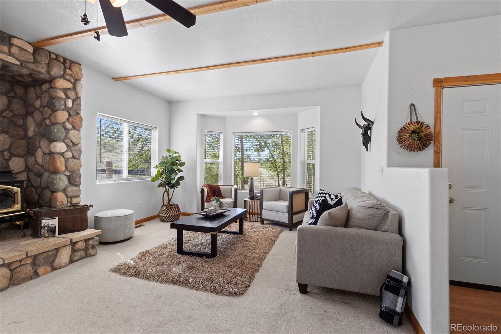 7551 Remington Road Como, CO 80432 - Photo 8 of 35 a living room with furniture and a window