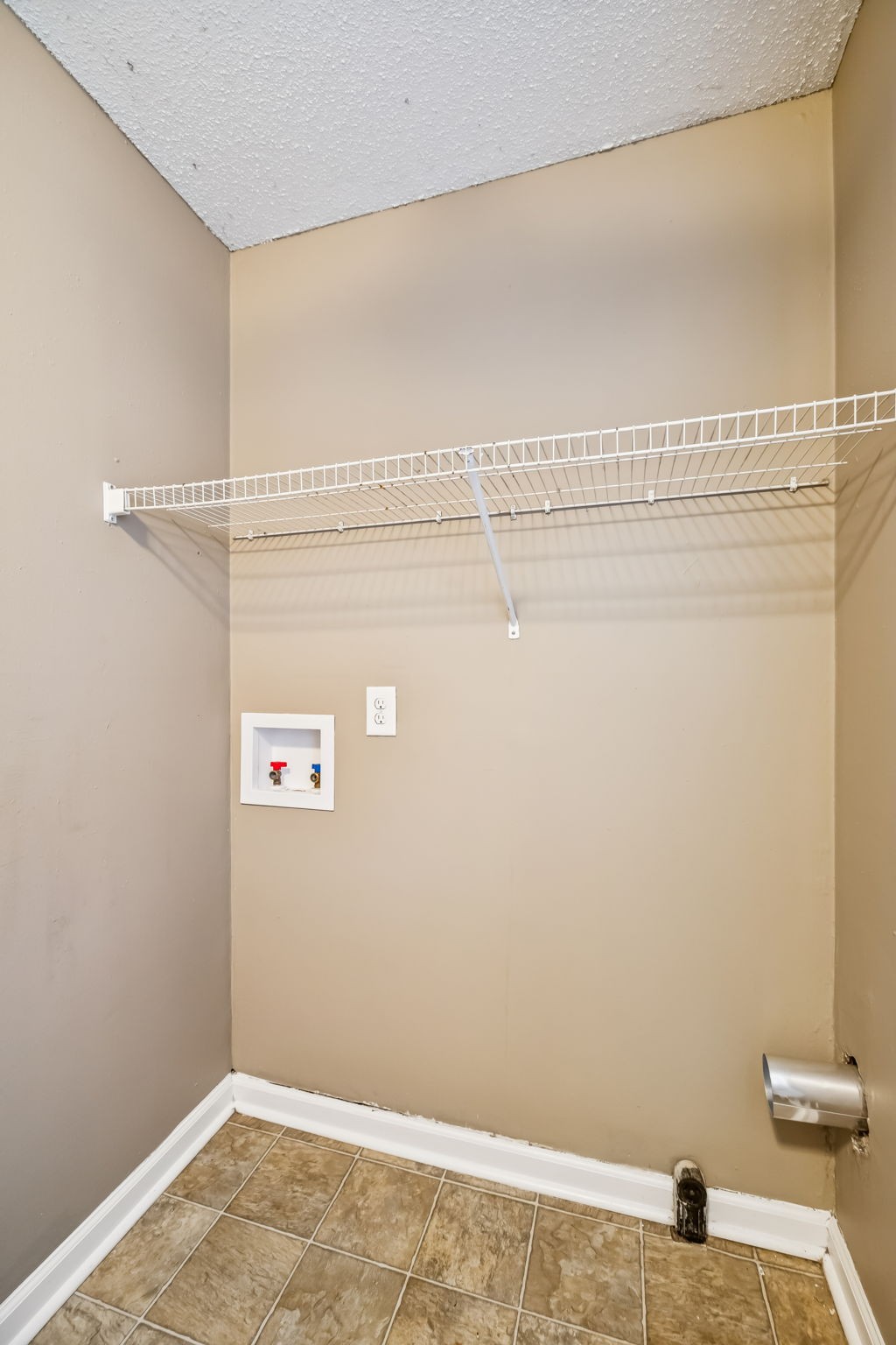 236 Tobacco Road Clarksville, TN 37042 - Photo 13 of 27 a view of a room with racks on the wall