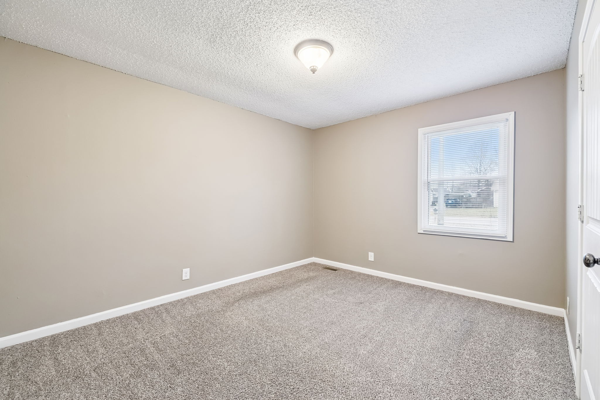 236 Tobacco Road Clarksville, TN 37042 - Photo 20 of 27 a view of an empty room with a window