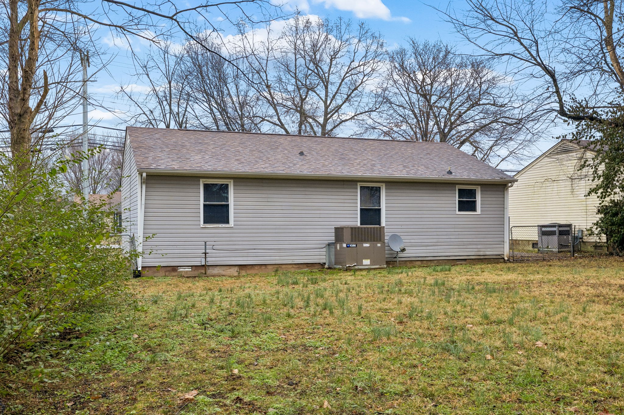 236 Tobacco Road Clarksville, TN 37042 - Photo 24 of 27 a view of a house with a yard