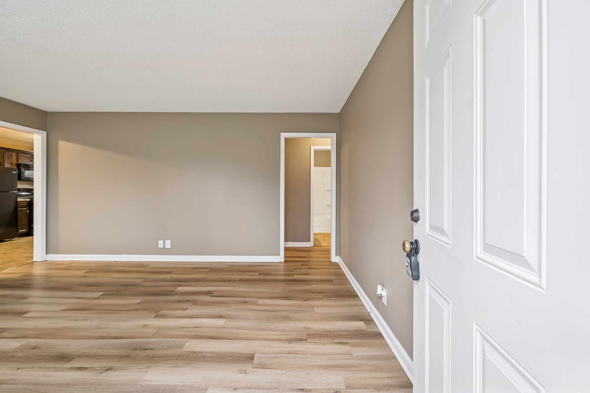 236 Tobacco Road Clarksville, TN 37042 - Photo 5 of 27 a view of a hallway with wooden floor