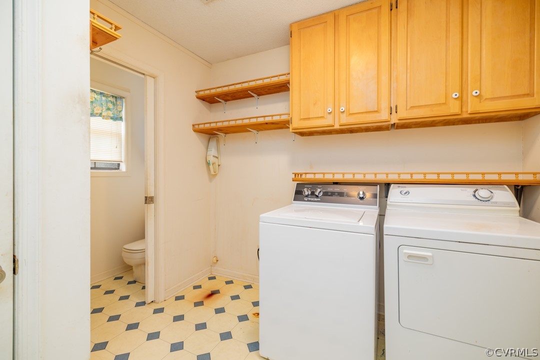 1218 Hardy Road Lunenburg, VA 23952 - Photo 9 of 35 a utility room with dryer and washer