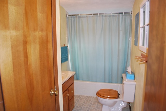 4255 East Flagg Road Ashton, IL 61006 - Photo 14 of 25 a bathroom with a sink and a toilet