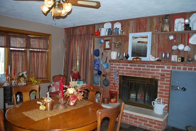 4255 East Flagg Road Ashton, IL 61006 - Photo 8 of 25 a view of a livingroom with furniture and chandelier