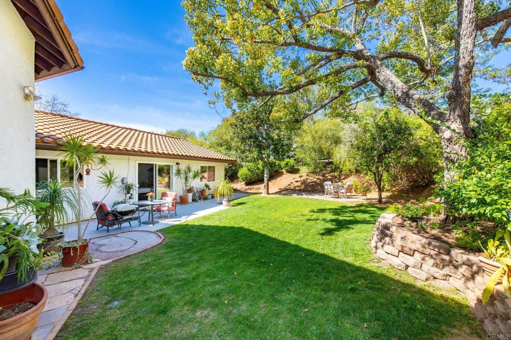 1402 Rimrock Drive Escondido, CA 92027 - Photo 17 of 69 a view of a house with a garden