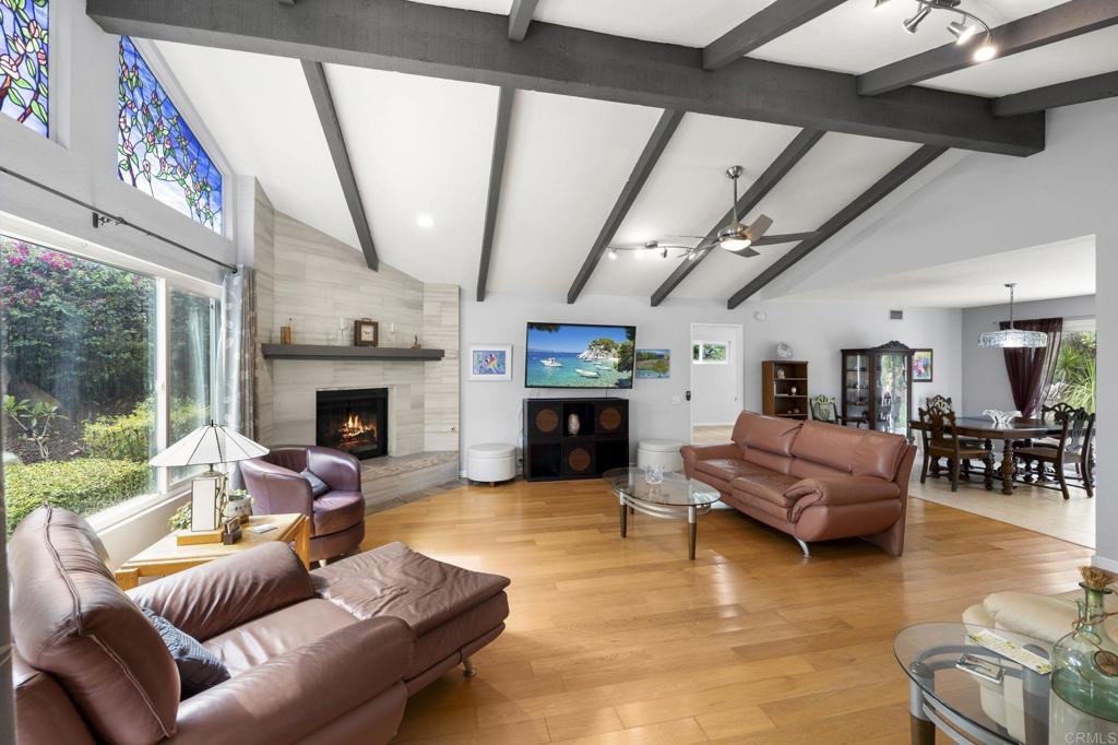 1402 Rimrock Drive Escondido, CA 92027 - Photo 22 of 69 a living room with furniture and a fireplace