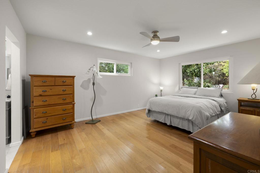 1402 Rimrock Drive Escondido, CA 92027 - Photo 27 of 69 a bedroom with a bed and a dresser