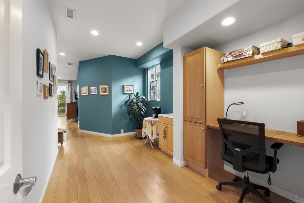 1402 Rimrock Drive Escondido, CA 92027 - Photo 34 of 69 a view of a hallway with workspace and a window