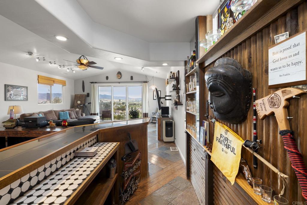 1402 Rimrock Drive Escondido, CA 92027 - Photo 43 of 69 a kitchen with stainless steel appliances granite countertop lots of counter top space