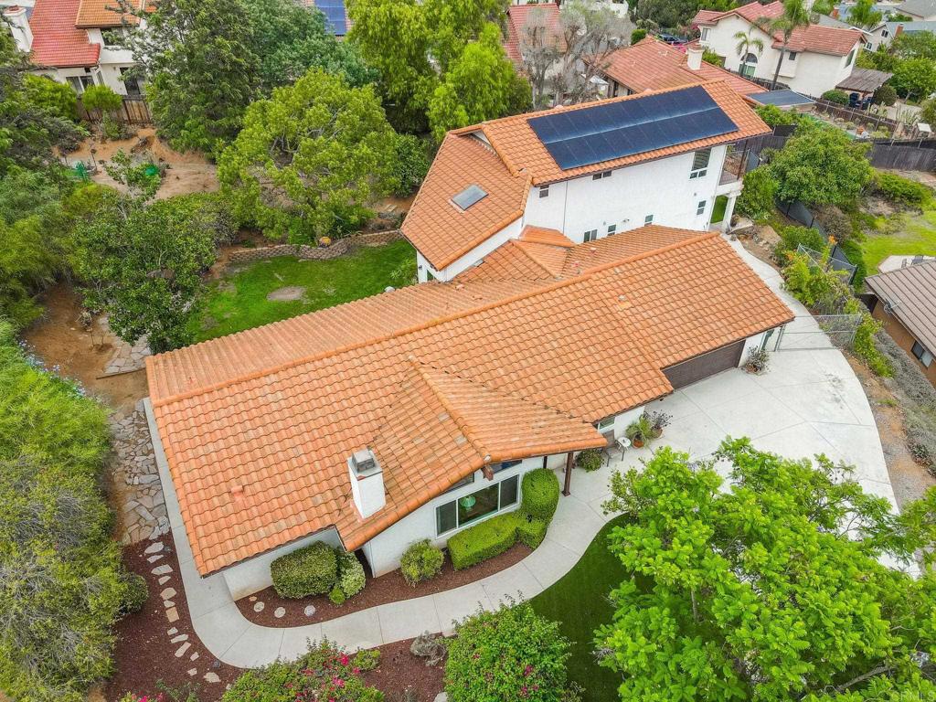 1402 Rimrock Drive Escondido, CA 92027 - Photo 59 of 69 an aerial view of a house with a yard and potted plants