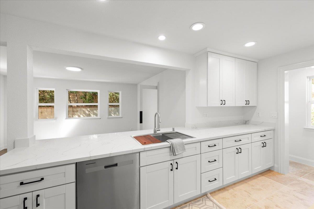3306 Leavesley Road Gilroy, CA 95020 - Photo 21 of 60 a kitchen with sink and cabinets