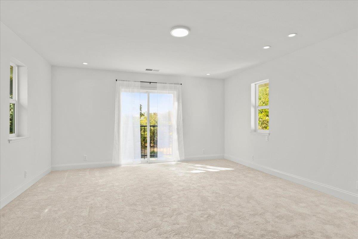 3306 Leavesley Road Gilroy, CA 95020 - Photo 30 of 60 a view of an empty room with a window