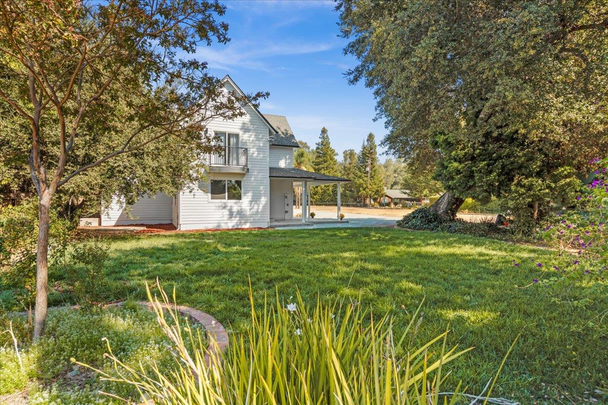 3306 Leavesley Road Gilroy, CA 95020 - Photo 45 of 60 a view of a house with a yard
