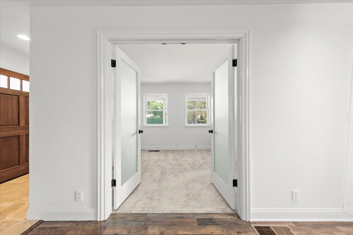 3306 Leavesley Road Gilroy, CA 95020 - Photo 10 of 60 an entryway view with wooden floor and a living room