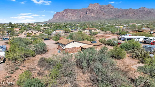 an aerial view of residential house with outdoor space