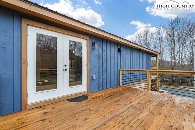 a view of balcony with wooden floor