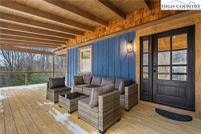 a outdoor living space with furniture and garden view