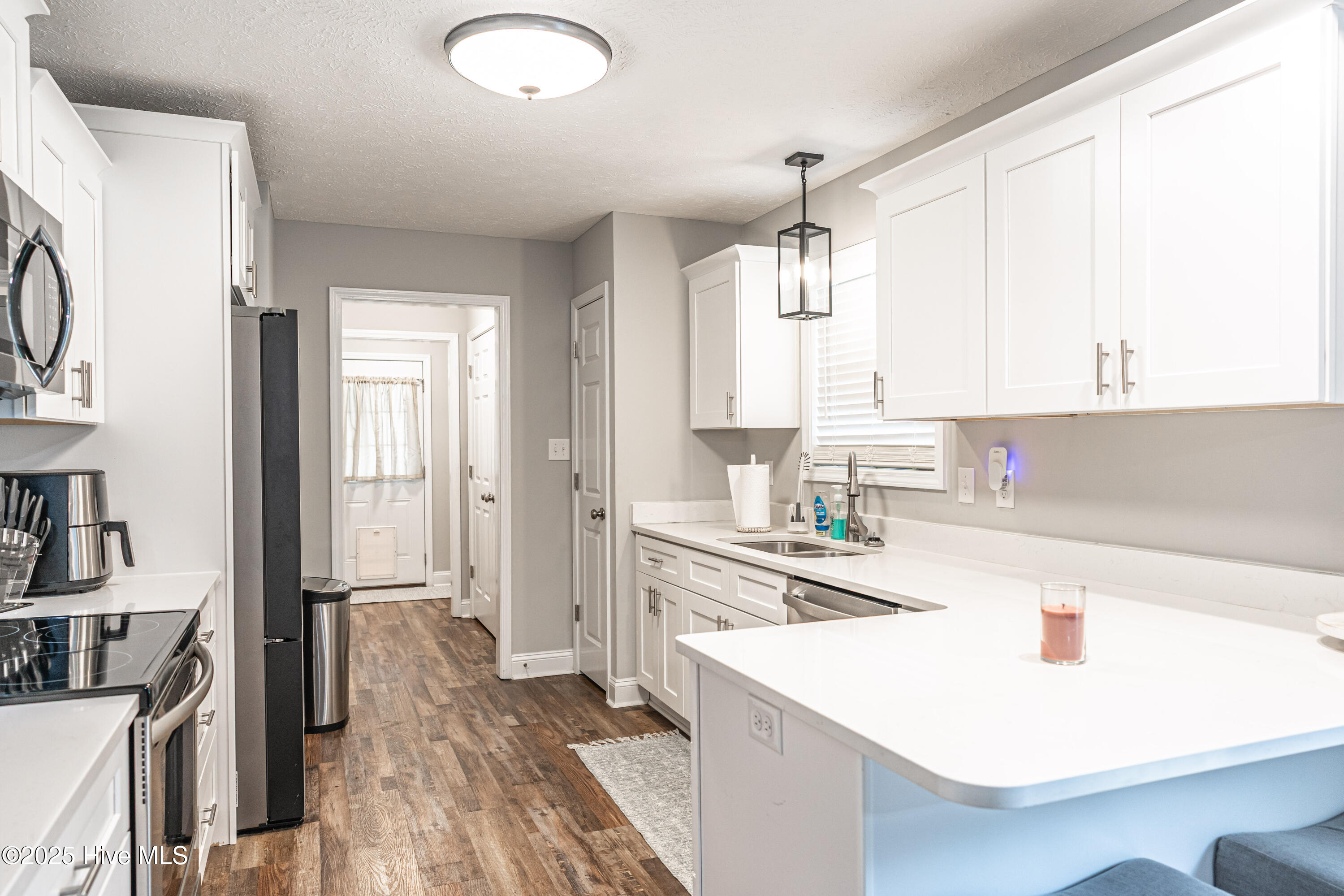 2019 Brooklyn Lane Rockingham, NC 28379 - Photo 12 of 33 kitchen from dining at angle