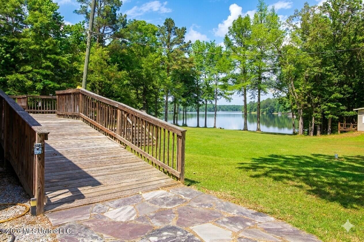 116 Lake Stephens Road Canton, MS 39046 - Photo 14 of 20 AI backyardremoved debrislakefront