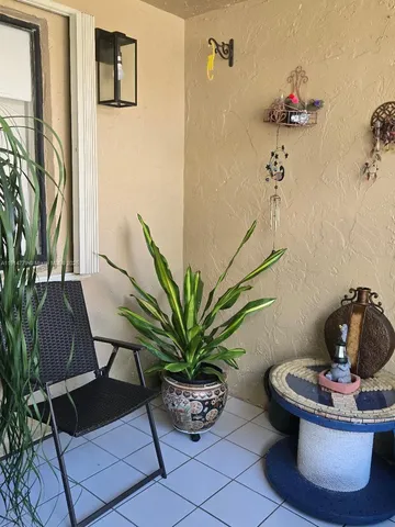 a vase of flowers sitting on a table