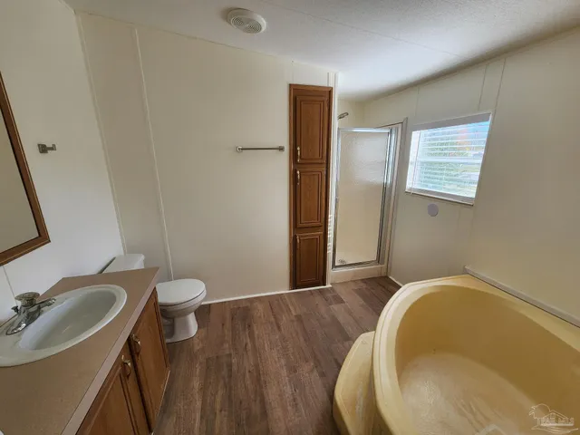 a bathroom with a sink and a toilet