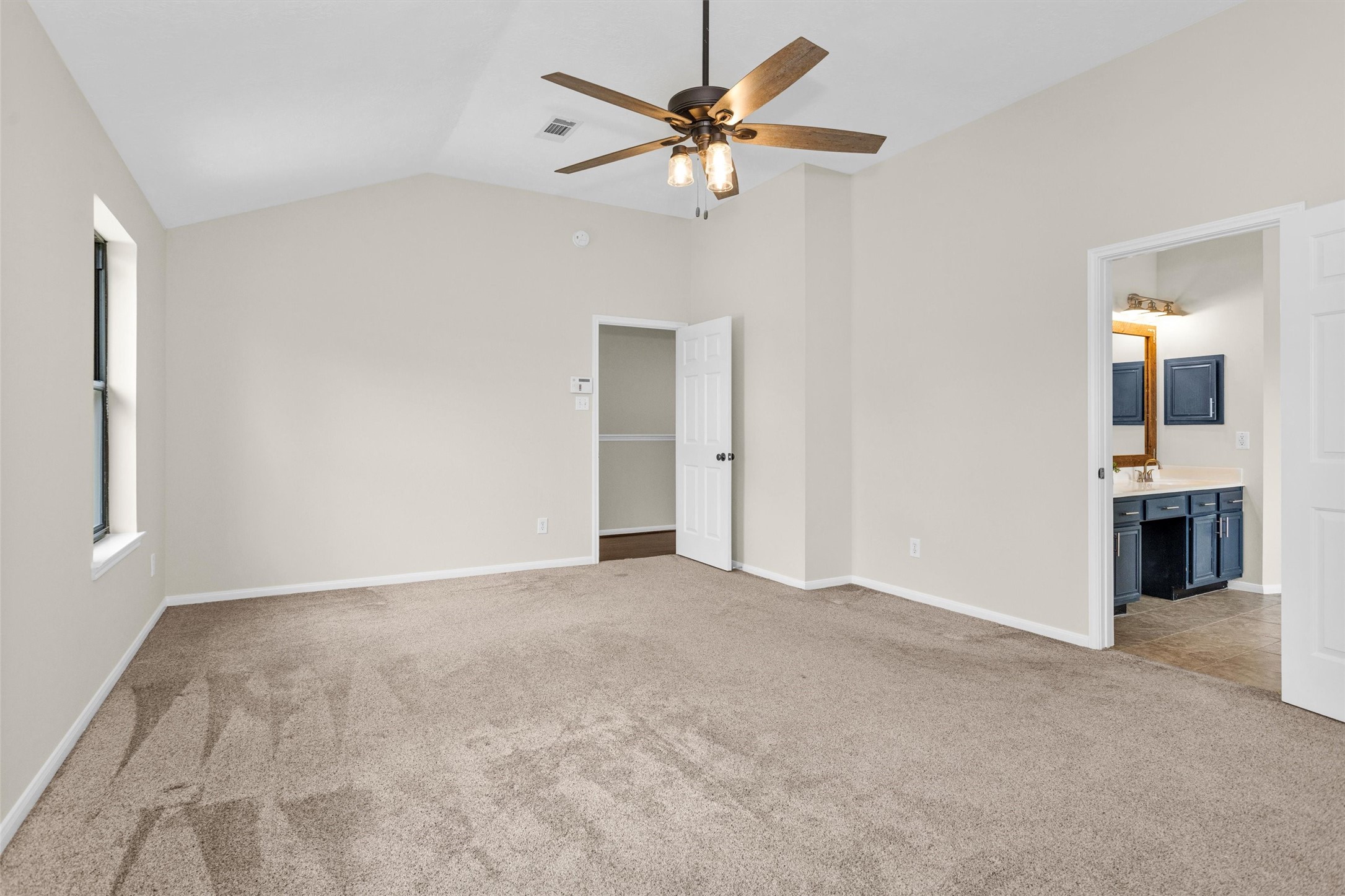 7419 Alderly Drive Spring, TX 77389 - Photo 22 of 49 an empty room with fan and windows