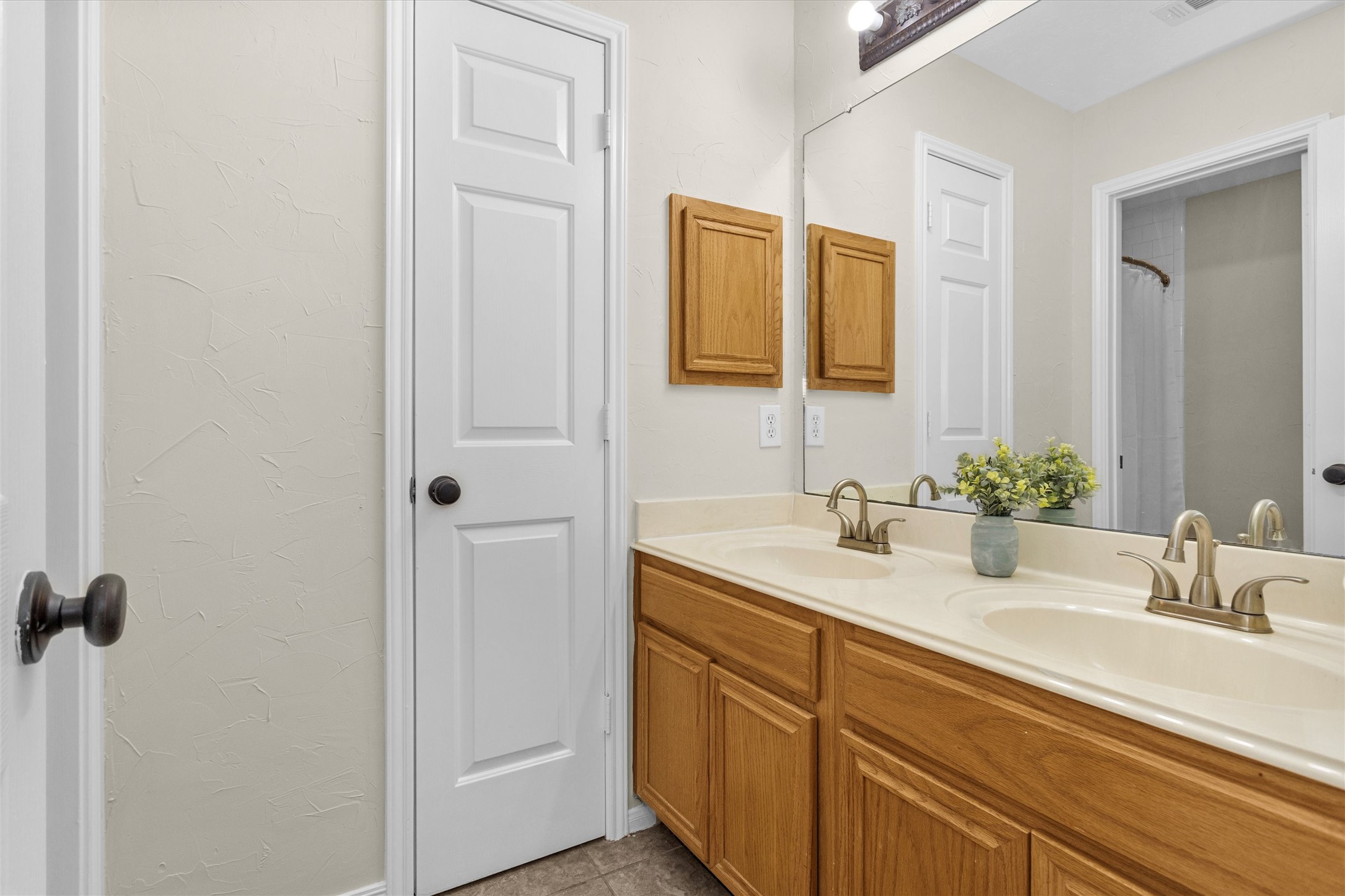 7419 Alderly Drive Spring, TX 77389 - Photo 31 of 49 a bathroom with a sink and a mirror
