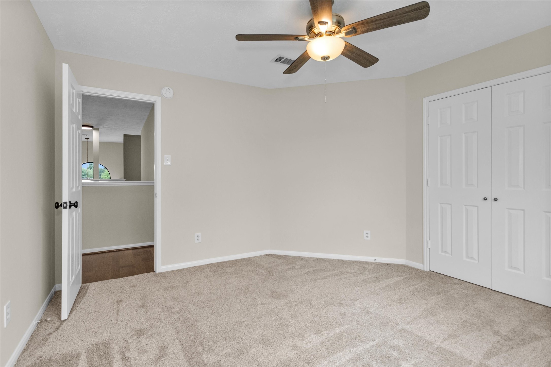 7419 Alderly Drive Spring, TX 77389 - Photo 33 of 49 an empty room with chandelier fan
