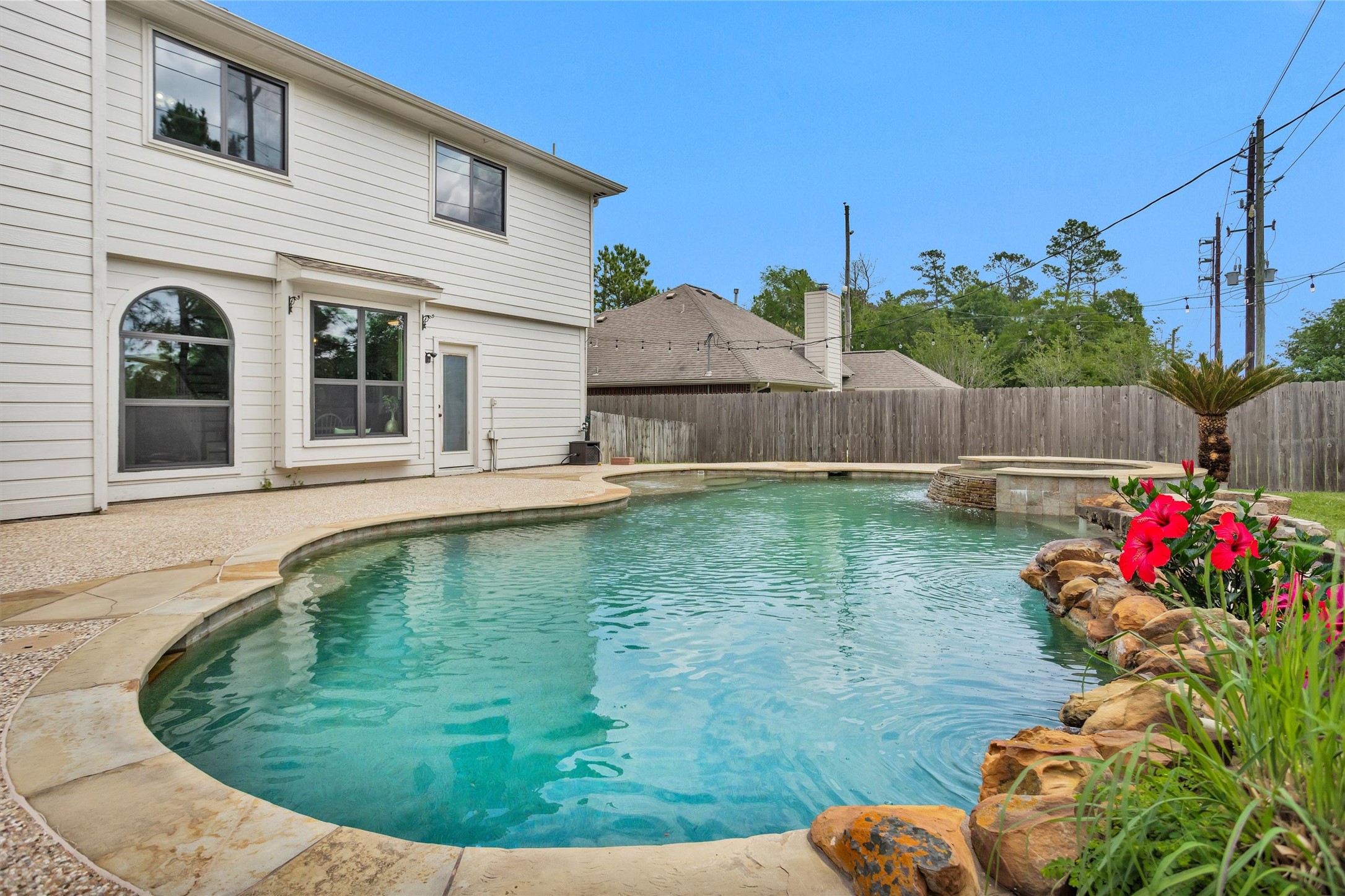 7419 Alderly Drive Spring, TX 77389 - Photo 36 of 49 a view of a house with a swimming pool
