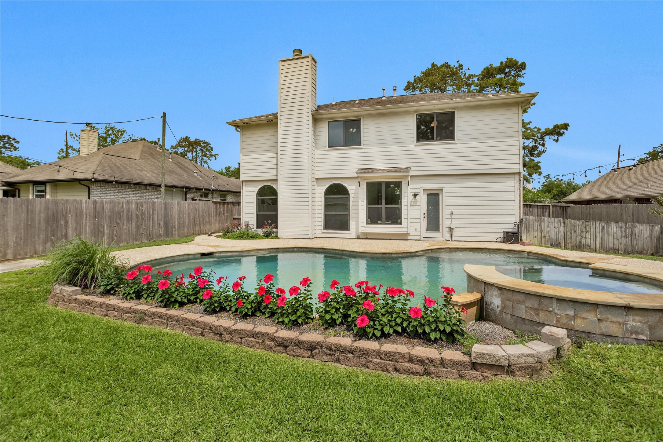 7419 Alderly Drive Spring, TX 77389 - Photo 37 of 49 a view of a house with a yard and sitting area