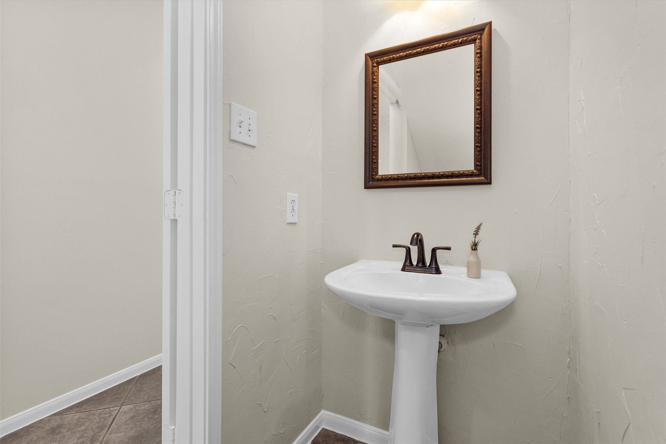 7419 Alderly Drive Spring, TX 77389 - Photo 6 of 49 a bathroom with a sink and a mirror