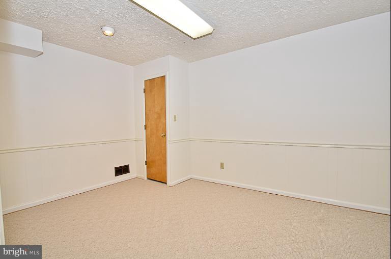 6342 11th Road North Arlington, VA 22205 - Photo 4 of 22 Den in lower level w/recessed lighting