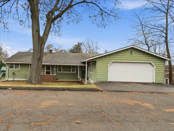 a view of house with outdoor space