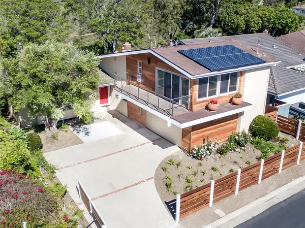 an aerial view of a house with balcony